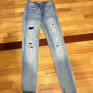 Trendy Distressed Women's Skinny Jeans in Light Blue